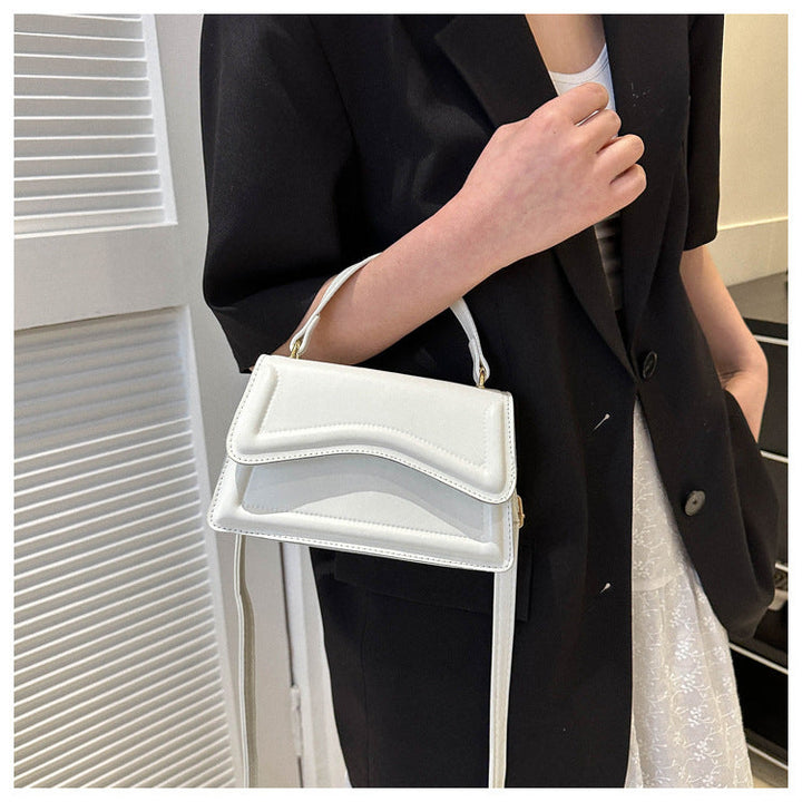 Bloom ™ |  Belvoir mini-tas